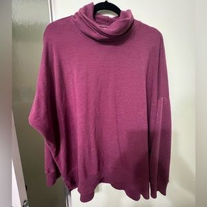 Red, loose fitting sweatshirt